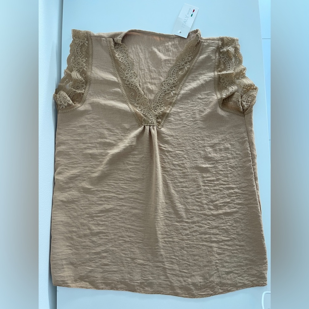 sleeveless blouse color sand with lace at collar and shoulder